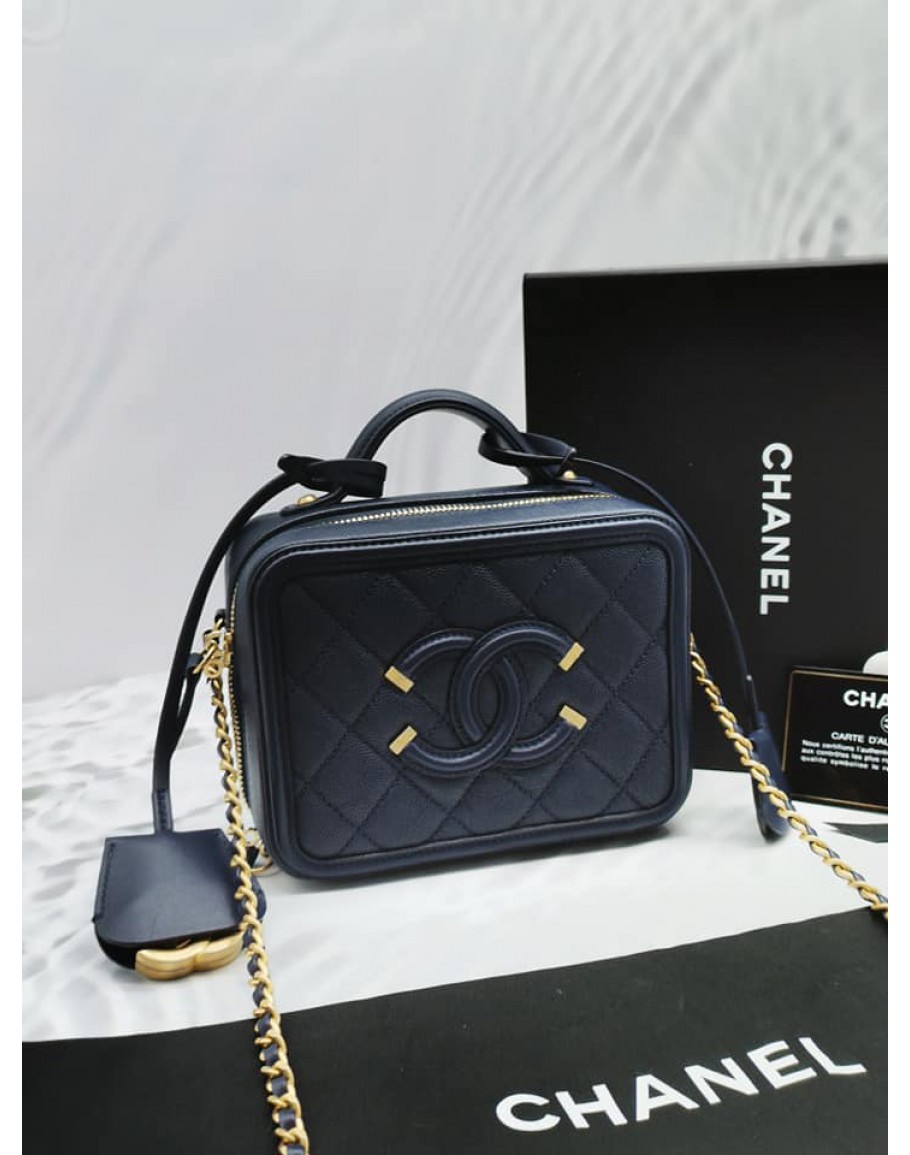 Chanel cc filigree vanity case online bag